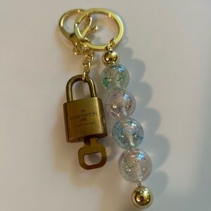 Louis Vuitton Gold and Iridescent Key Holder